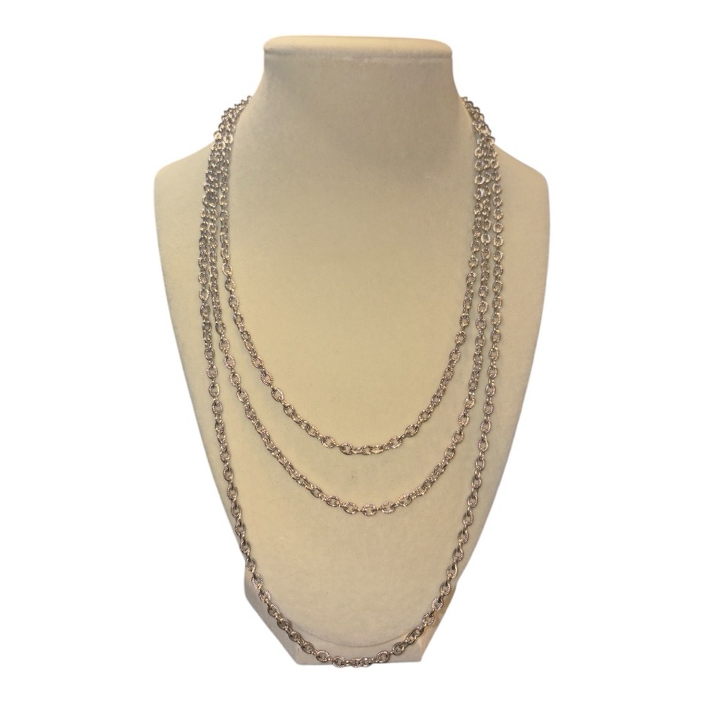 Avon silver tone triple strand chain with beautiful large clasp. J25